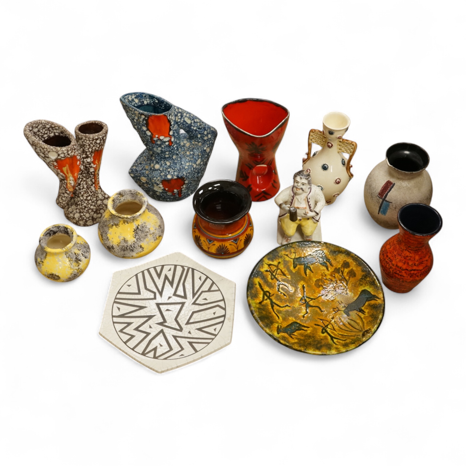 A collection of studio ceramics and pottery to include a Zsolnay vase and a Lyn Alves hexagonal dish